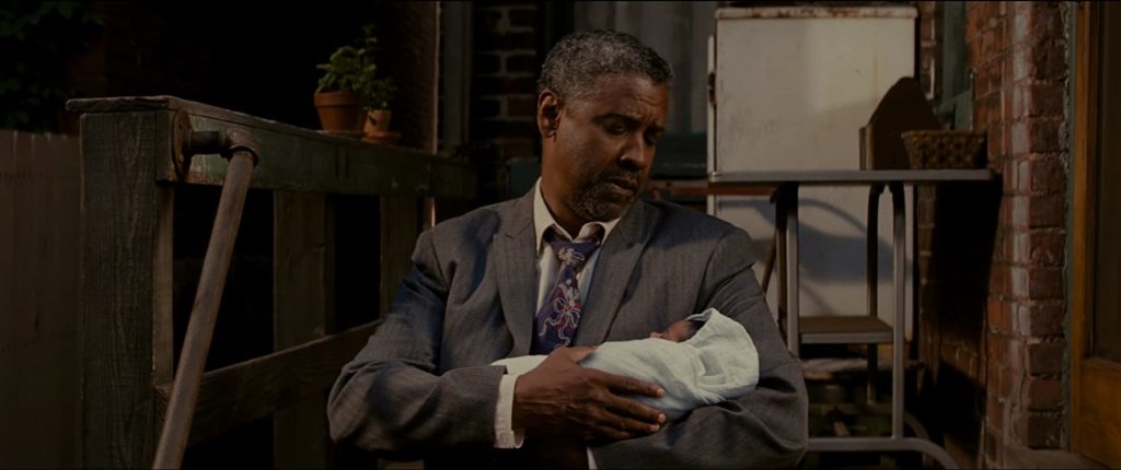 In Fences (2016), a working-class African-American father tries to raise his family in the late 1950s.